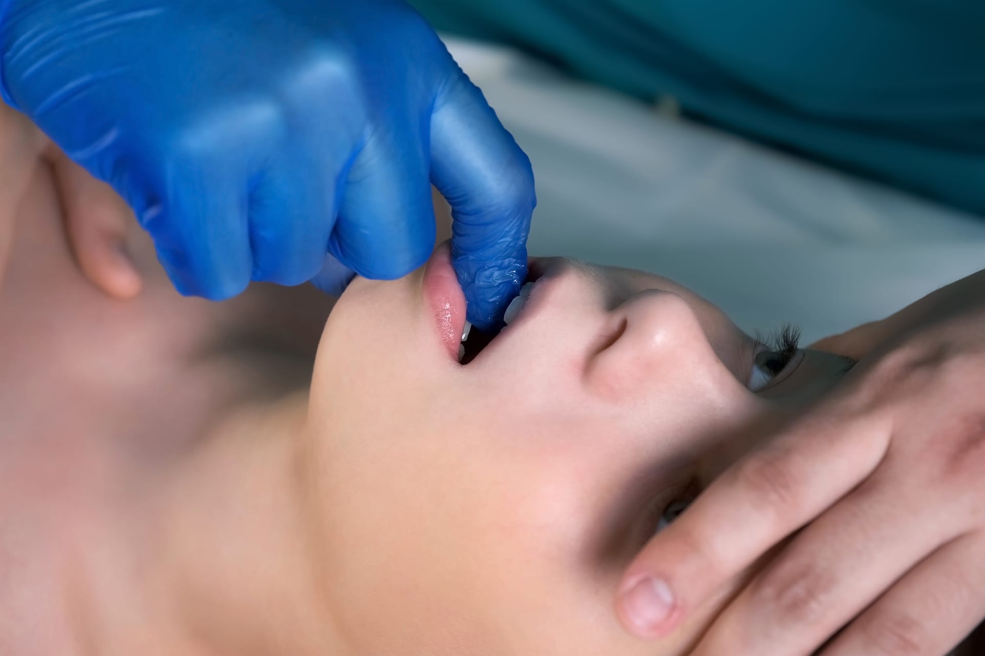 Craniosacral therapist performing gentle jaw and bite correction work